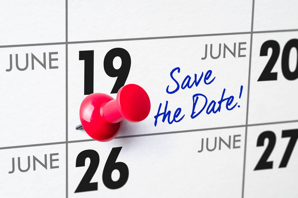 Wall calendar with a red pin - June 19 - Photo, Image