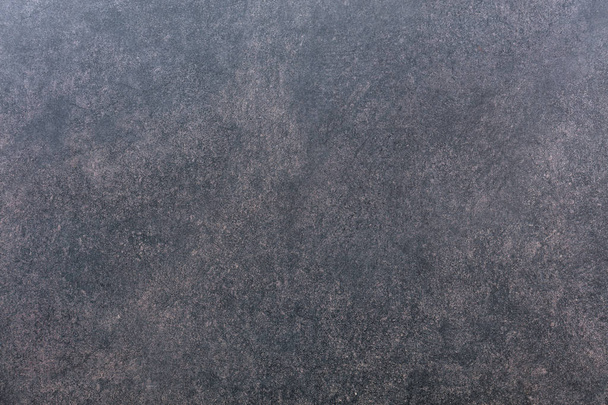 The texture of a wall of gray-red granite - Photo, Image