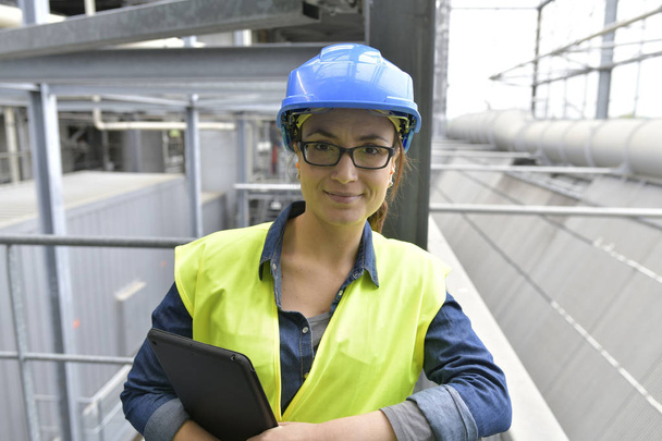 Industrial engineer standing in recycling plant - Photo, image