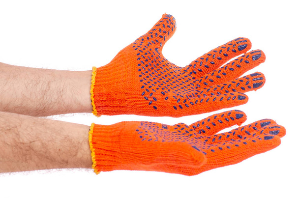 Male hands in working build gloves - Foto, Bild
