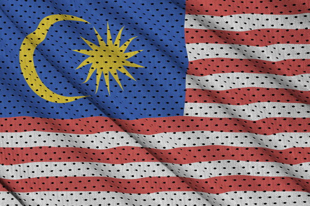 Σημαία της Μαλαισίας εκτυπώνονται σε ένα fabri αθλητικά με πλέγμα πολυεστέρα νάιλον - Φωτογραφία, εικόνα