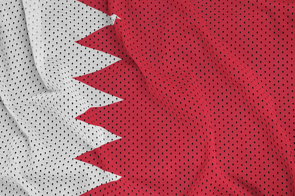 Bahrain flag printed on a polyester nylon sportswear mesh fabric - Photo, Image