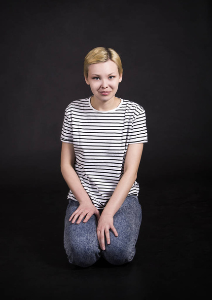 Young woman in striped tee shirt. - Zdjęcie, obraz