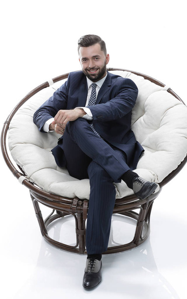 businessman sitting in a comfortable chair - Fotoğraf, Görsel