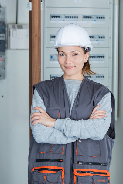 Portrait of young female electrician - Foto, Imagen