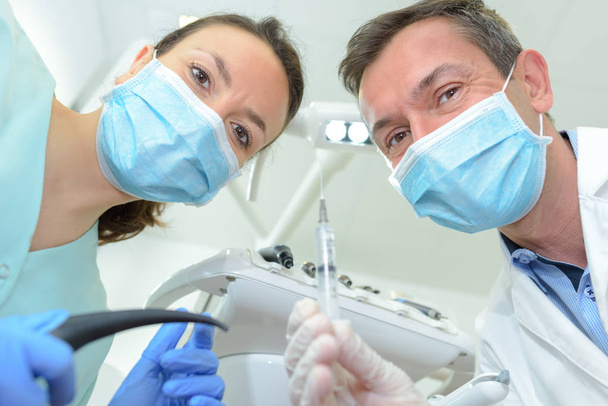 female and dentist at a dental clinic - Фото, зображення