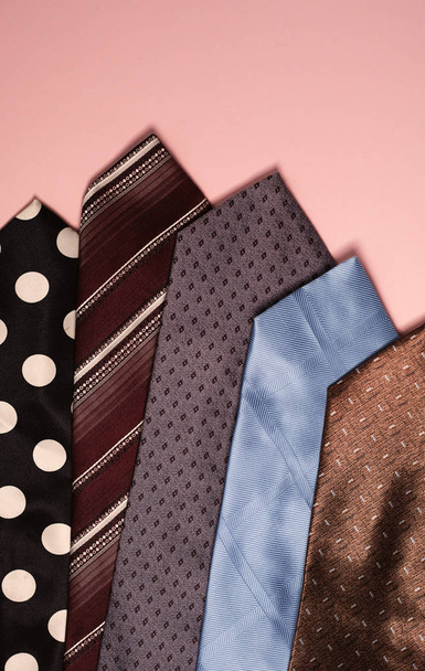 Several beautiful men's ties in different colors - 写真・画像