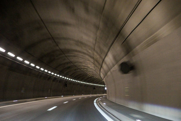 High-speed turn in the tunnel. - Zdjęcie, obraz