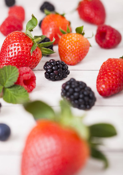 Freash organic healthy berries on wood background - Zdjęcie, obraz