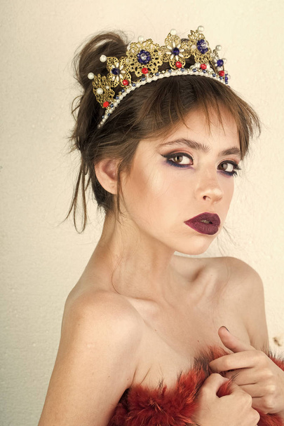 Fashion girl with elegant look. Fashion and beauty of young stylish woman in queen crown - Photo, image