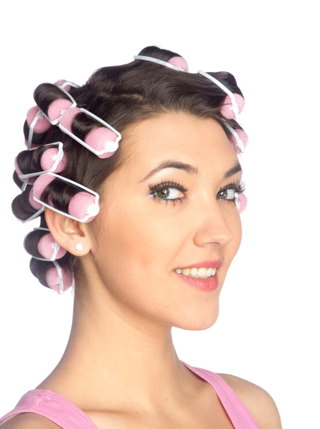 Funny girl with hair curlers on her head - Fotoğraf, Görsel