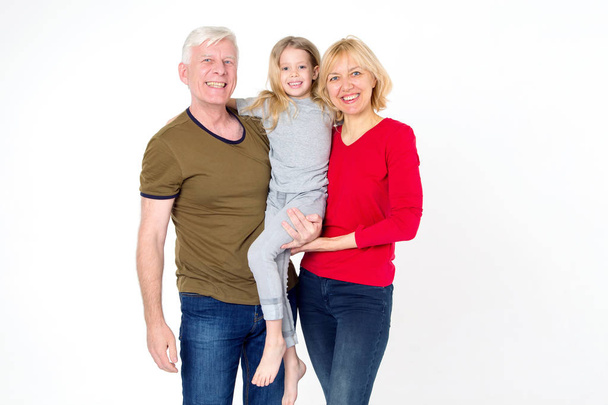 Happy cheerful family. Dad, mom and daughter. - Photo, Image
