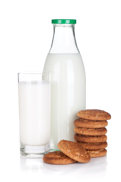 Glass, bottle of milk and cookies - 写真・画像