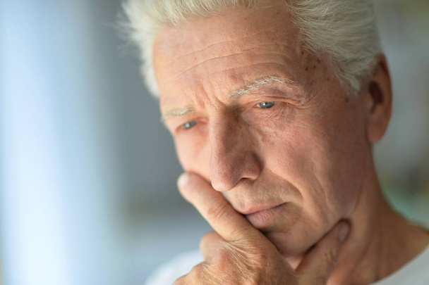 Portrait of Sad senior man at home - Foto, Imagen