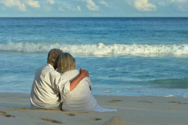 Happy elderly couple on tropical  beach  - Fotografie, Obrázek