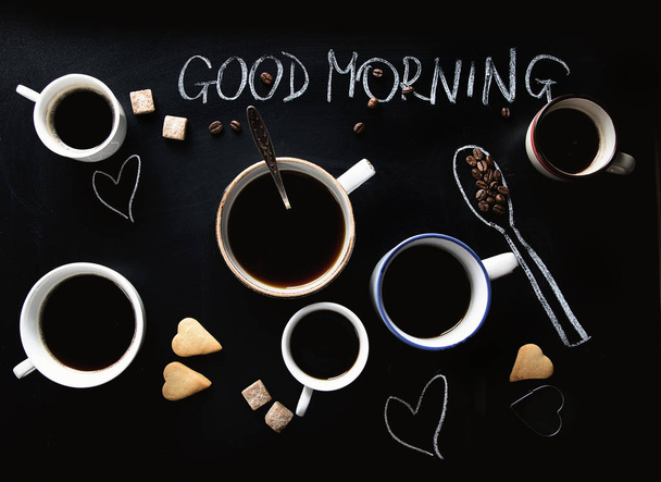 Coffee cup on chalkboard. Good Morning Coffee Concept. Top view - Foto, Bild