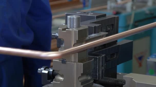 Bending of metal tubes on industrial machine in factory. - Footage, Video
