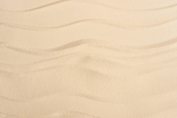 Texture of sandy beach with smooth waves - Photo, Image