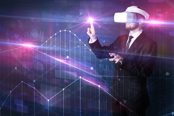 Man standing with VR goggles and graphs charts - Photo, Image