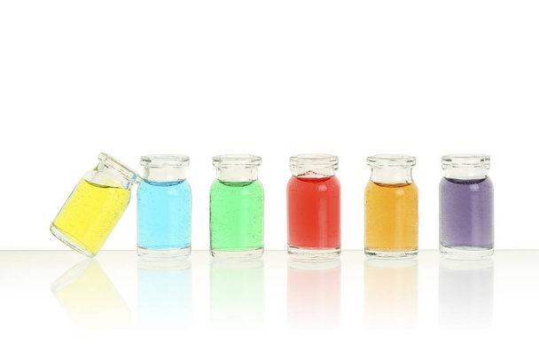 six colorful bottles - Фото, изображение