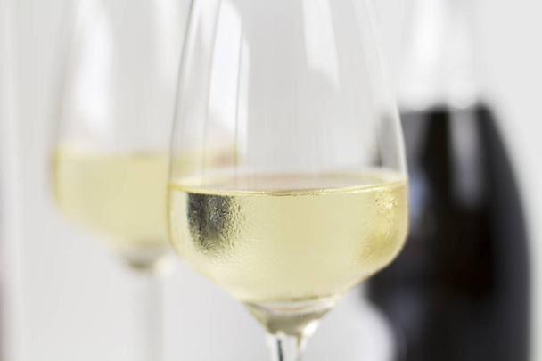 Champagne on a white background - Fotó, kép