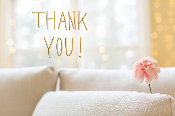 Thank You message with flower in interior room sofa - Foto, afbeelding