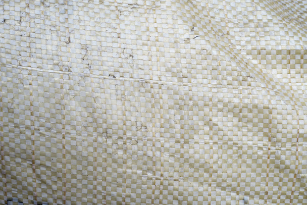 Gesloten omhoog rijst tas of kunstmest zak Textured. - Foto, afbeelding