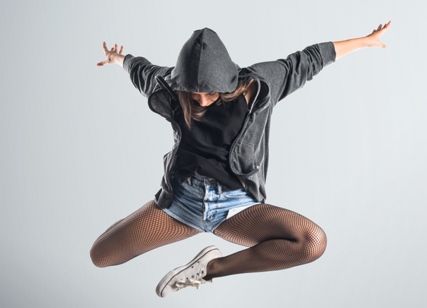 Підліток хіп-хоп танцюрист стрибає
 - Фото, зображення