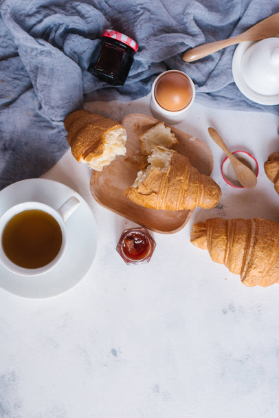 fresh croissants with jam for breakfast - Foto, Imagen