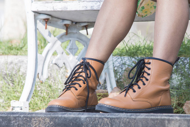 woman legs in boots - Foto, afbeelding