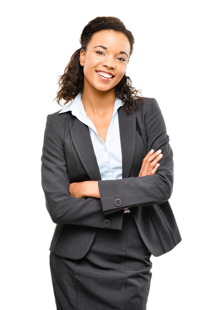 Young mixed race businesswoman with arms folded smiling isolated - 写真・画像