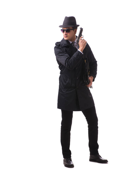 Muž špion s pistolí izolované na bílém pozadí - Fotografie, Obrázek