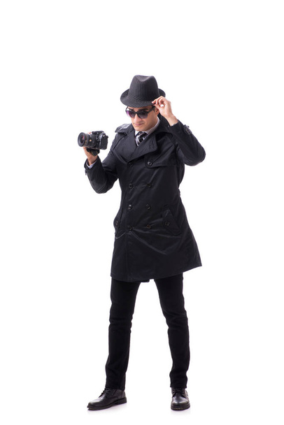 Spy with camera taking pictures isolated on white - Foto, imagen