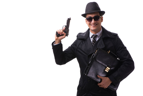 Hombre espía con pistola aislada sobre fondo blanco - Foto, Imagen
