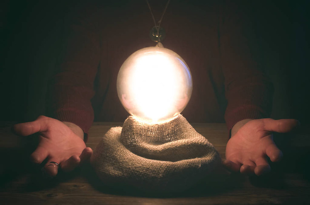 Crystal ball and fortune teller hands. Divination concept. The spiritual seance. Future reading. - Φωτογραφία, εικόνα