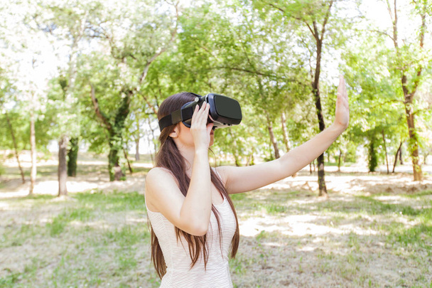 Woman wearing Virtual Reality Goggles  - Φωτογραφία, εικόνα