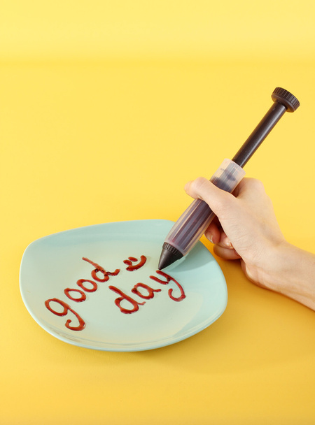 Jam inscription on plate on yellow background - 写真・画像
