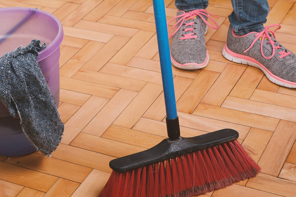 Close up of woman cleaning the floor - Foto, Bild