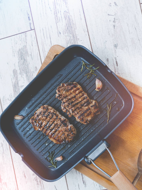 Two Grilled Steaks On a Grill Pan. Top View. - Valokuva, kuva