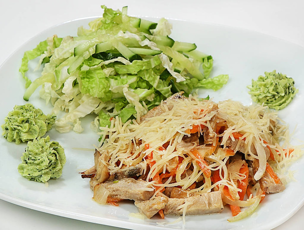 Warm salad of pork, vegetables and mushrooms in cream, salad and cheese mix - Photo, Image