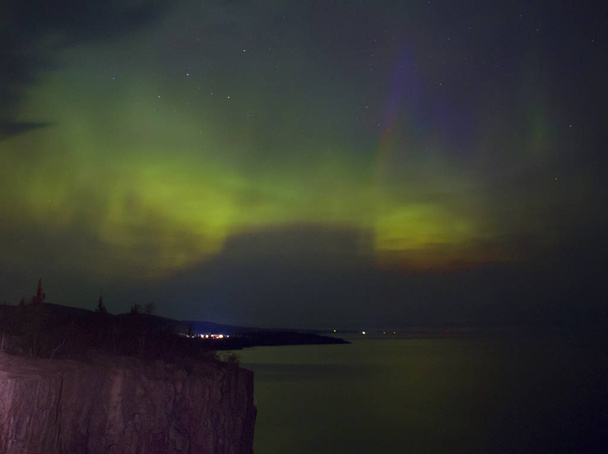 Northern Lights over a Lake in Minnesota during Summer - Photo, image
