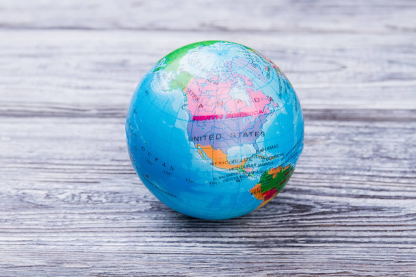 Earth globe on wooden table. - Photo, Image