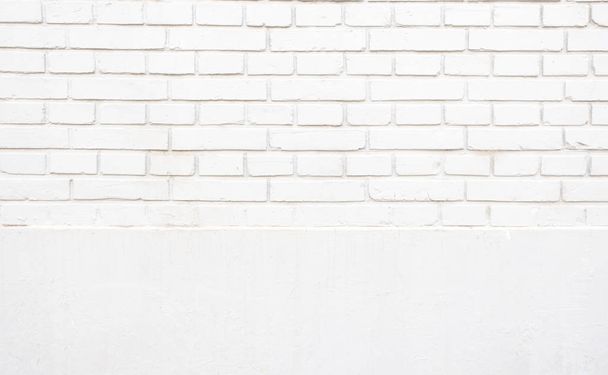 Grunge white two section brick wall texture background,outdoor w - 写真・画像