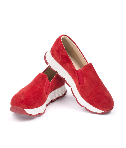 Red Women's sneakers on a white background - Photo, Image
