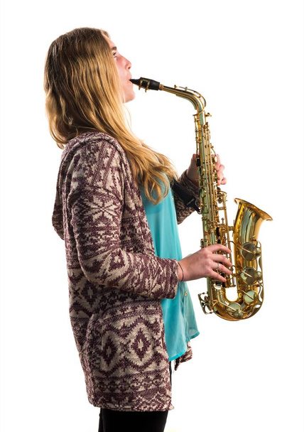 Girl playing the saxophone - Valokuva, kuva