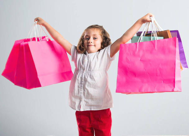 Girl with many shopping bags - Foto, Imagem