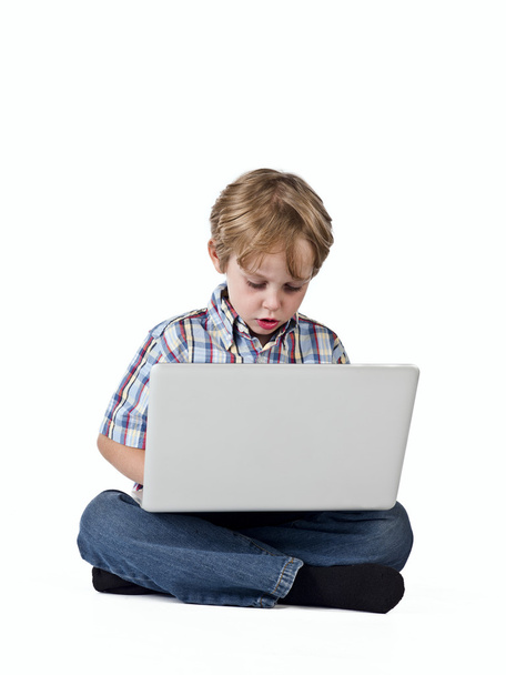 boy browsing on laptop - Φωτογραφία, εικόνα