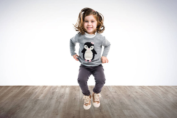 Little girl jumping - Photo, Image