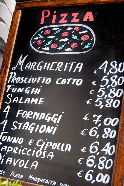 Italian menu exposed outside a restaurant - Photo, Image