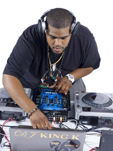 DJ з ноутбуком і поворотним столом
 - Фото, зображення